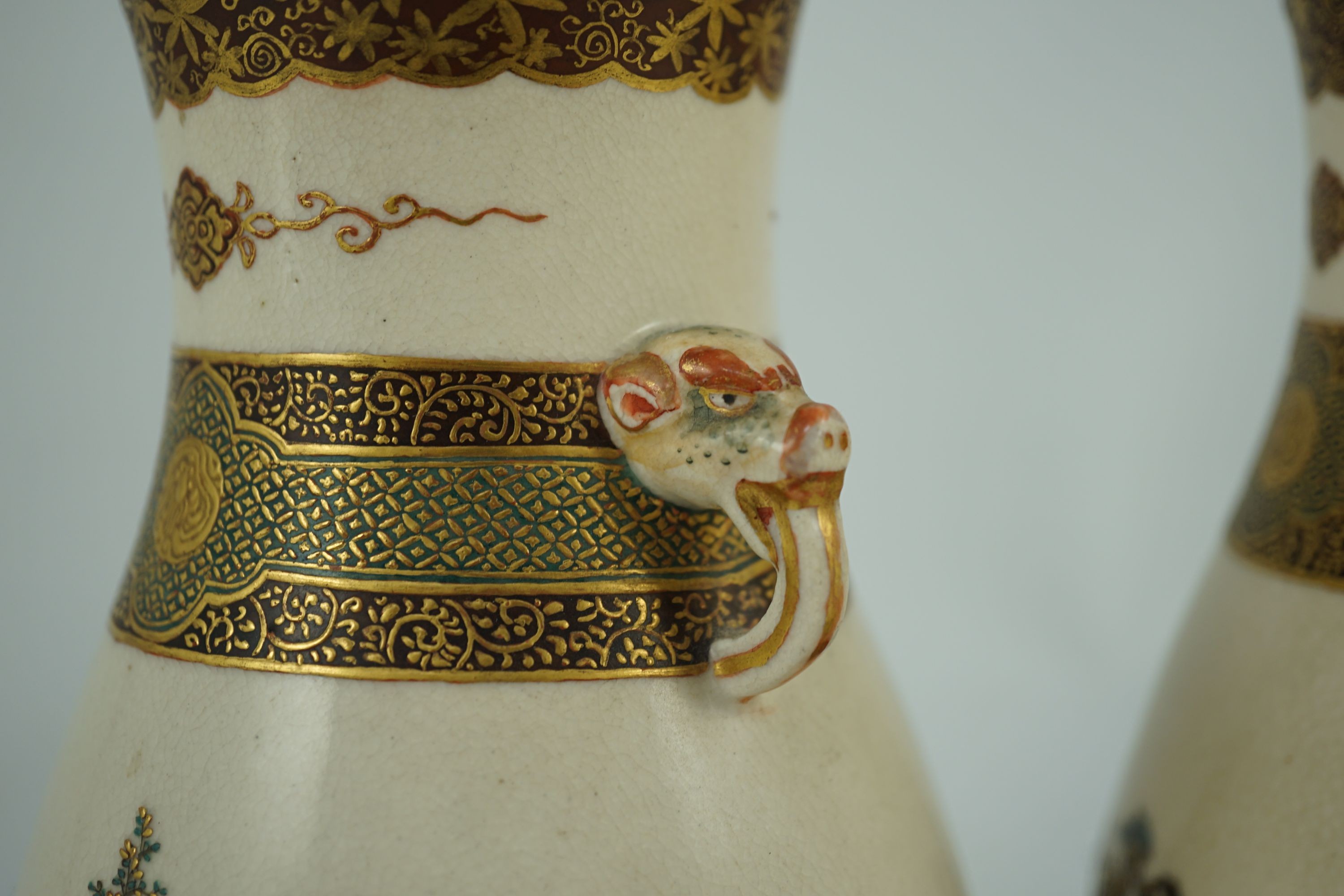 A pair of Japanese Satsuma pottery vases, by Bizan, Meiji period, 18.2cm high